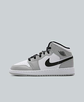 Jordan Junior Jordan 1 Mid Trainer in Black / White / Grey