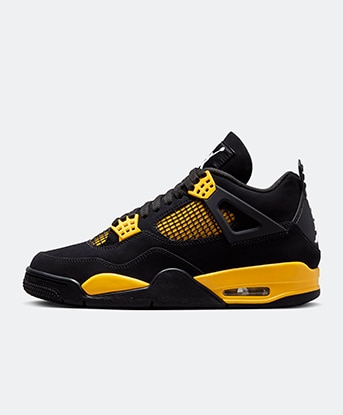 Jordan Air Jordan 4 Retro Trainer in Black / Yellow Thunder
