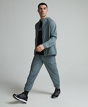 Nike Dri-FIT Form Tapered Versatile Pant in Smoke Grey / Black / Reflective