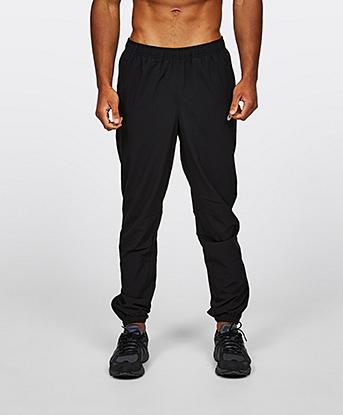 Asics Core Woven Pant in Black
