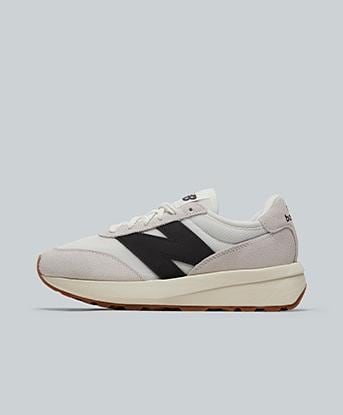 New Balance Womens 370 Trainer in White / Black Cement