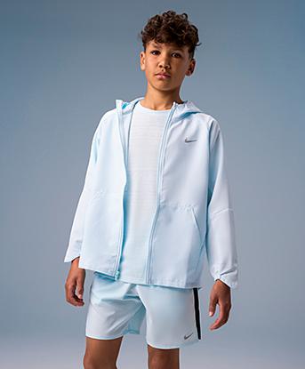 Nike Junior Dri-FIT UV Woven Jacket in Glacier Blue / Reflective Silver