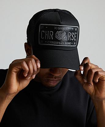 Christian Rose Vinyl Trucker Cap in Black