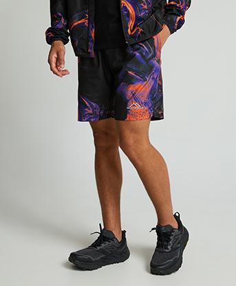 Monterrain Saturn Woven Short in Black / Orange / Blue / Multi