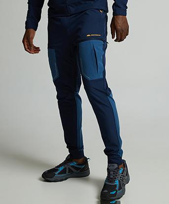 Monterrain Orbit Woven Running Pant in Black Iris / Ensign Blue / Orange Pop