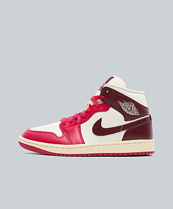 Jordan Womens Air Jordan 1 Mid Trainer in Sail / Dark Team / Mystic Hibiscus