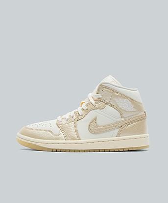 Jordan Womens Air Jordan 1 Mid Trainer in Sail / Team Gold / Ivory