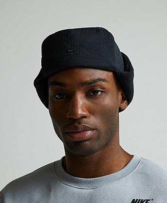 Nike Fly Puffer Trapper Hat in Black / Sandrift