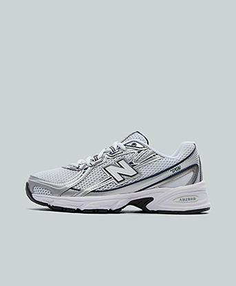 New Balance Junior 740 Trainer in White / Navy / Silver