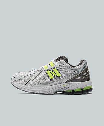New Balance Junior 1906 Trainer in Black Metallic / Alkaline Green