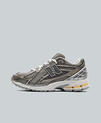 New Balance Womens 1906R Trainer in Slate Grey / Orange