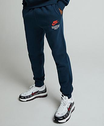 Nike Authorized Personel Fleece Jogger in Armoury Navy / Picante Red