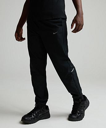 Nike Junior Miler Woven Pant in Black / Reflective Silver