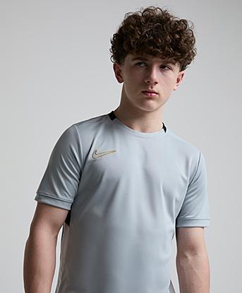 Nike Junior Academy T-Shirt in Light Smoke Grey / White / Black / Gold