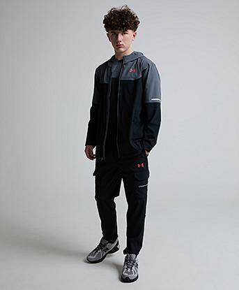 Under Armour Junior Tech Utility Woven Pant in Black / Venom Red