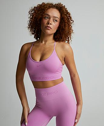 Nike Womens Pro Dri-FIT Seamless Bra Top in Light Magenta