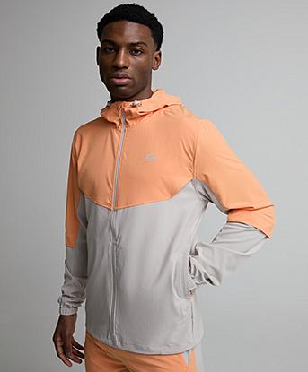 Alpyrex Ontera Windbreaker in Feather Cloud / Muted Tangerine