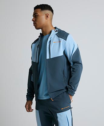 Monterrain Orbit Woven Running Hoodie in Twilight Graphite / Skybound Blue / Sunflare Amber