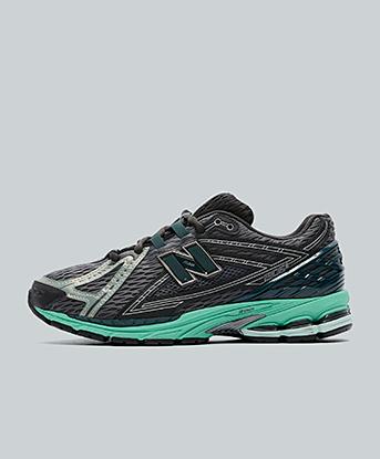 New Balance 1906 Trainer in Black Metallic / Teal