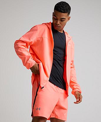 Under Armour UA Launch 7 Inch Short in Electric Tangerine / Titanium