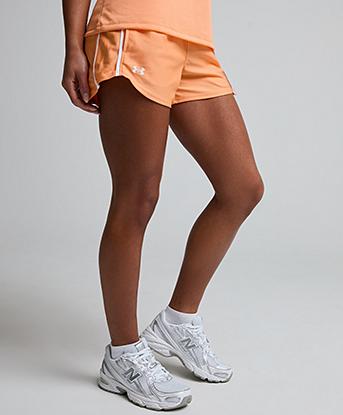 Under Armour Womens Tech Play Up Short in Orange Bloc / White