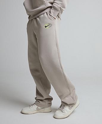 Nike On Tour Club Open Hem Jogger in Cream
