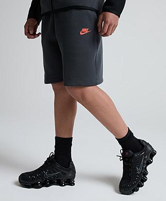 Nike Junior Tech Fleece Short in Anthracite / Turf Orange