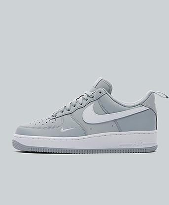 Nike Air Force 1 '07 Trainer in Mini Swoosh Grey / White