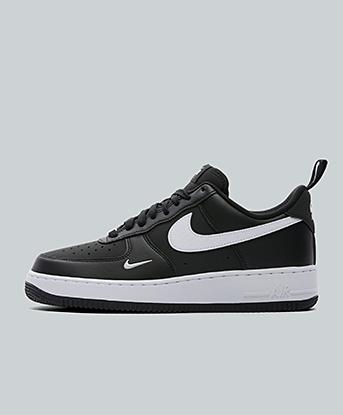 Nike Air Force 1 '07 Trainer in Mini Swoosh Black / White