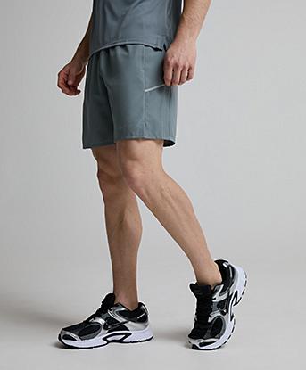 Nike Dri-FIT Miler 7 Inch Unlined Short in Smoke Grey / Iron Grey / Reflective Silver
