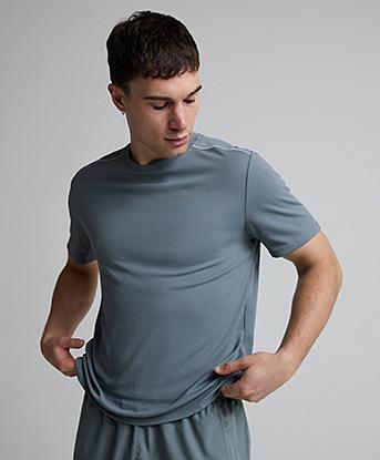 Nike Dri-FIT UV Miler Short Sleeved T-Shirt in Smoke Grey / Iron Grey / Reflective Silver