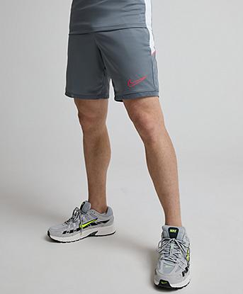 Nike Dri-FIT Academy Football Short in Smoke Grey / White / Hot Punch