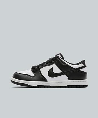 Nike Junior Dunk Low Trainer in White / Black / White