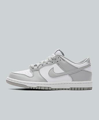 Nike Junior Dunk Low GS Trainer in White / Light Smoke Grey / White