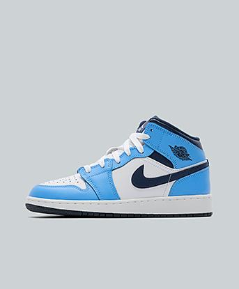 Jordan Junior Air Jordan 1 Mid Trainer in Midnight Navy / University Blue / White / Sail.
