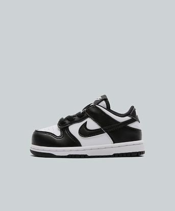 Nike Nursery Dunk Low Trainer in White / Black / White