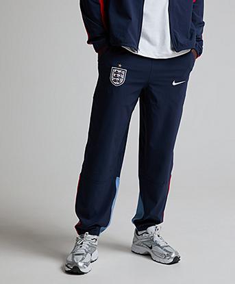 Nike England Energy Dri-FIT Football Woven Pant in Obsidian / Work Blue / Speed Red / White