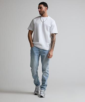 Alessandro Zavetti Osoli Slim Stacked Fit Denim Jean in Stone Washed Blue With Vintage Tint