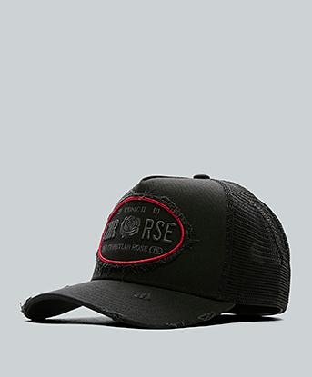 Christian Rose Iconic Oval Plate Trucker Cap in Black Distressed
