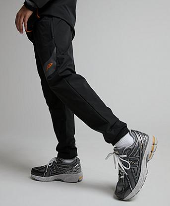Frequency Junior Adapt Track Pant in Grey / Shadow Orange