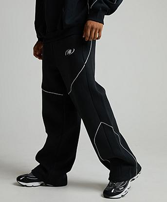 New Balance Trackside Fleece Pant in Black