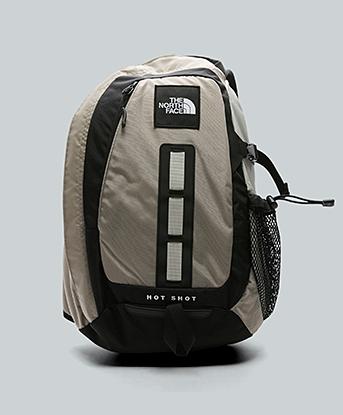 The North Face Hot Shot Sling Bag in Stone Slab / Cumulus Cloud