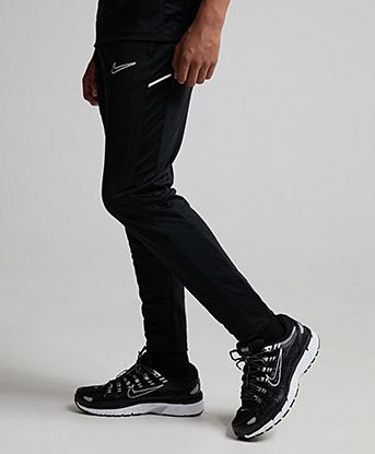 Nike Junior Academy Pant in Black / Black / White