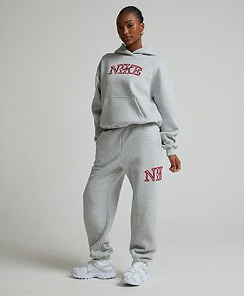 Nike Womens Studio Fleece Oversized Cuff Pant in Wolf Grey / Heather / Tough Red