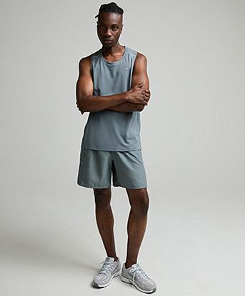 Nike Dri-FIT Miler Tank Top in Smoke Grey / Reflective Silver