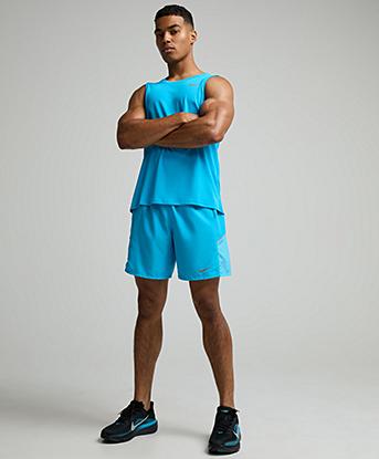 Nike Dri-FIT Miler Tank Top in Light Current Blue / Reflective Silver