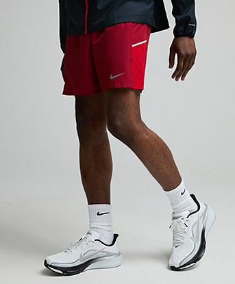 Nike Dri-FIT Miler 7 Inch Unlined Short in Tough Red / Sport Red / Reflective Silver