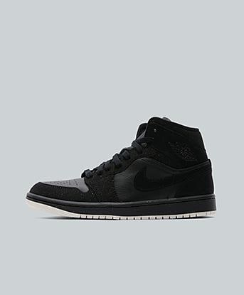 Jordan Womens Air Jordan 1 Mid Trainer in Black / Phantom White