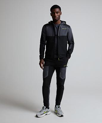 Monterrain Orbit Woven Running Pant in Black / Urban Charcoal / Citrus Fusion