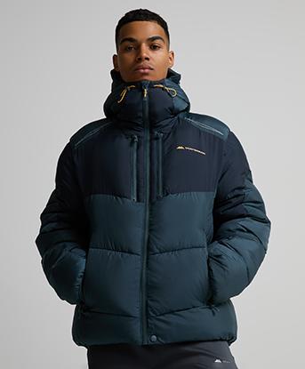 Monterrain Orbit Puffer Jacket in Twilight Graphite / Academy Blue / Pastel Ochre.